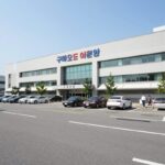 구마모토 이온몰 외관 전경, 넓은 주차장과 건물 모습